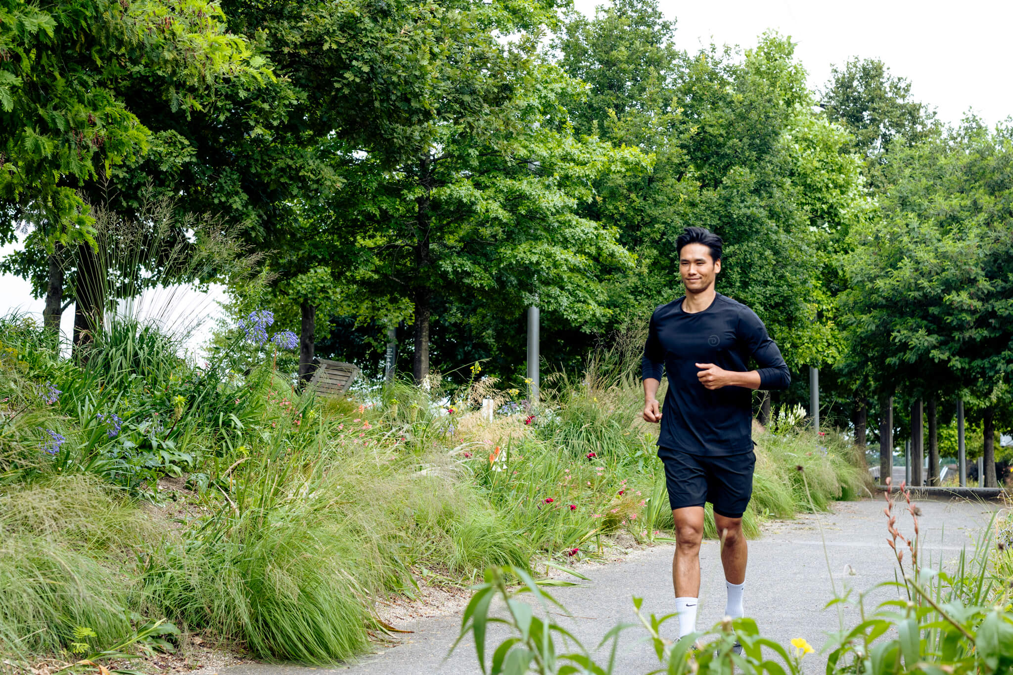 A man jogging along one of the pathways at Stratford Cross