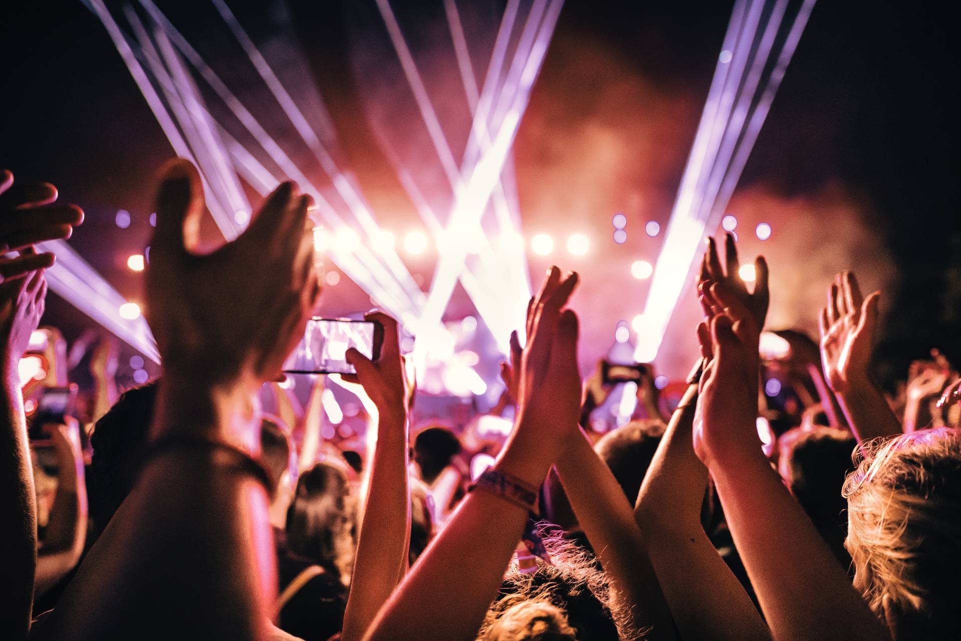 Hands in a crowd at a music show