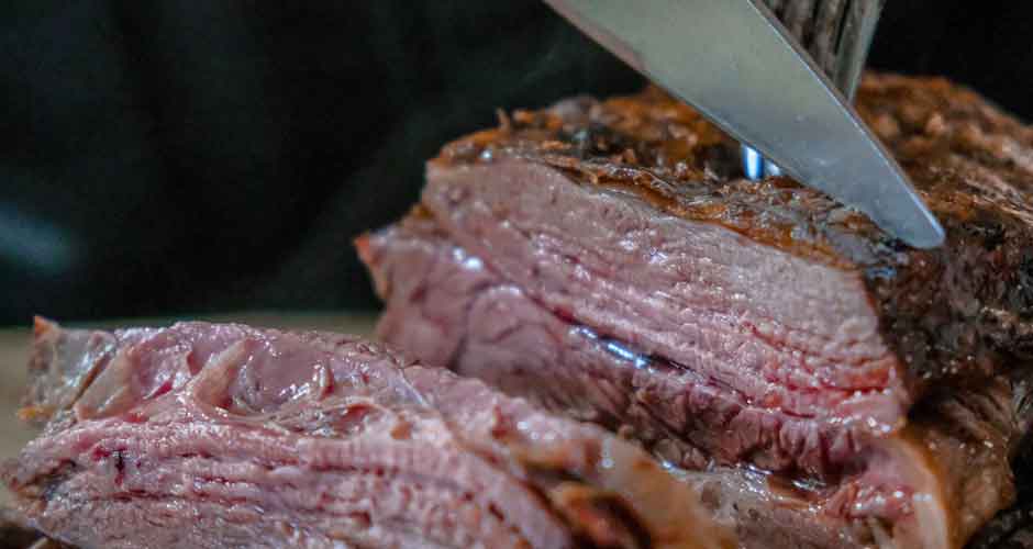 Carving a joint of beef.